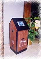 A TouchGuide Perfecta(TM) Series kiosk deployed in a hotel lobby. The color of the unit was chosen by the host to match the decor of the facility.